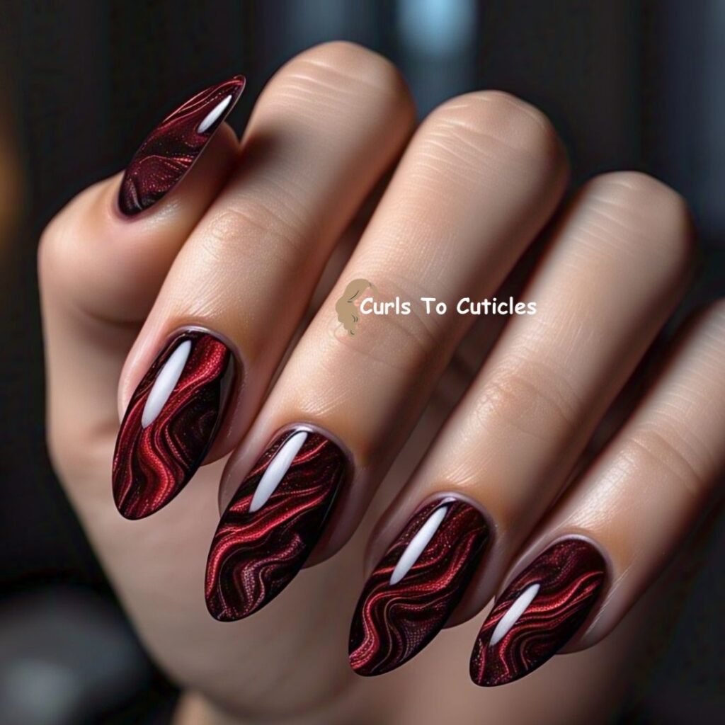 Black and Garnet Blend Garnet inspired nail design