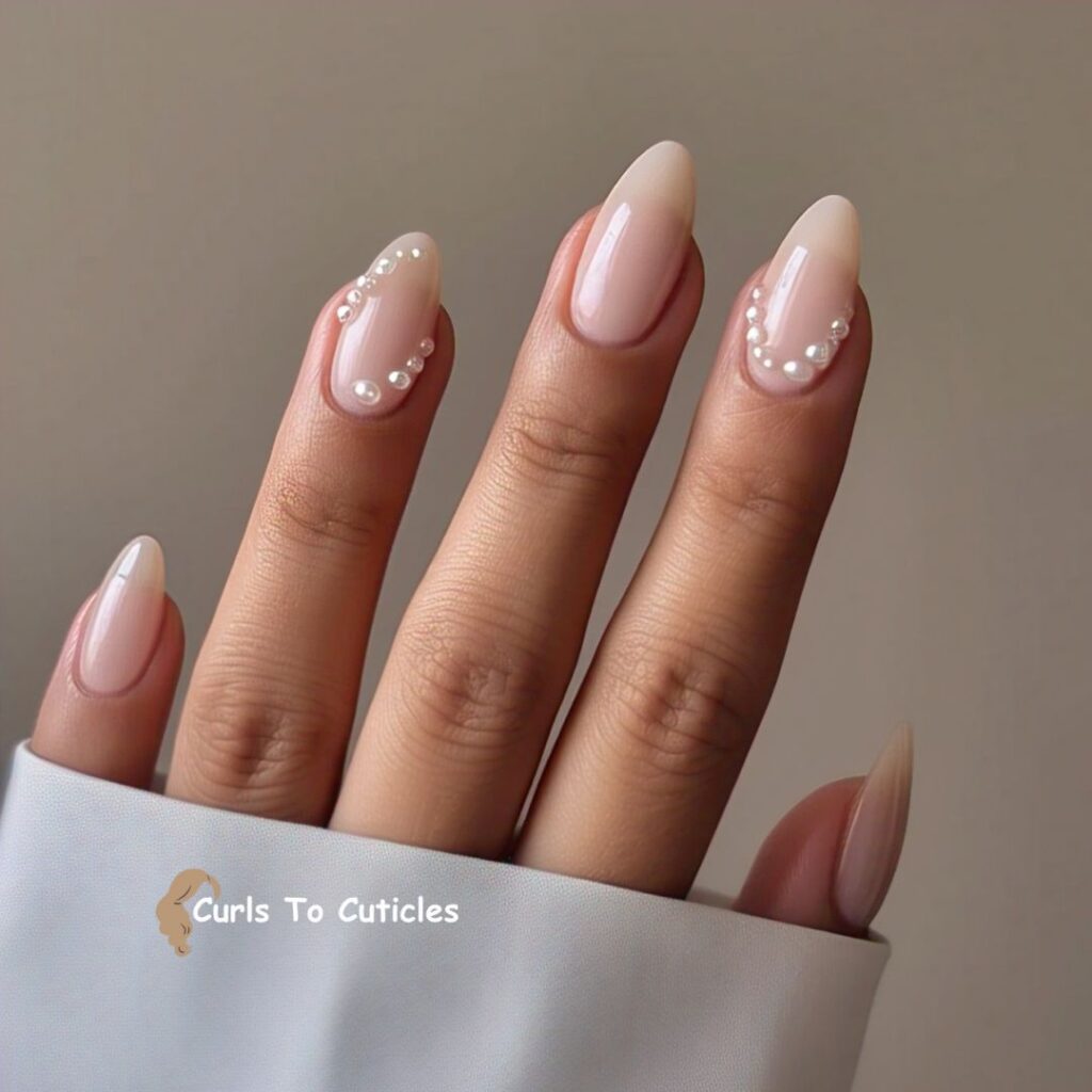 Pearl Embellished Almond Nails design
